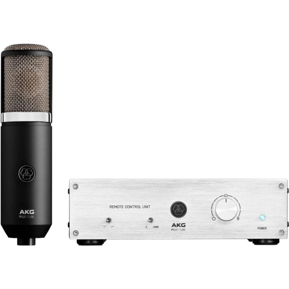 Black microphone and silver remote control unit with knobs and switches on white background.