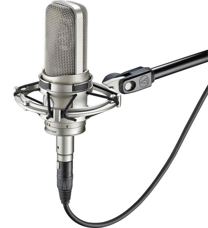 Silver studio condenser microphone with shock mount attached and an XLR-type audio cable connected.