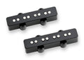 Two black rectangular bass guitar pickups with silver pole pieces on a white background.