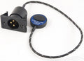 Black circular pickup sensor with SCHERTLER DYN-B-P48 label attached to fabric-covered cable and 3-pin male XLR connector with mounting plate.