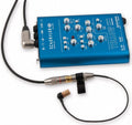 Blue Schertler audio preamplifier with attached pickup microphone and cable on white background.