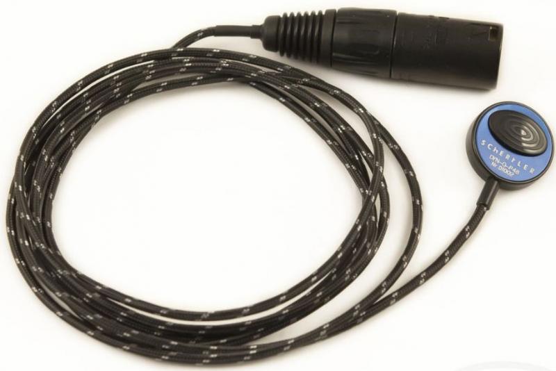 Black braided cable with circular sensor labeled SCHERTLER connected to a male XLR connector.
