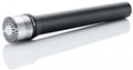 Black handheld microphone with silver grille and DPA logo on the grille ring