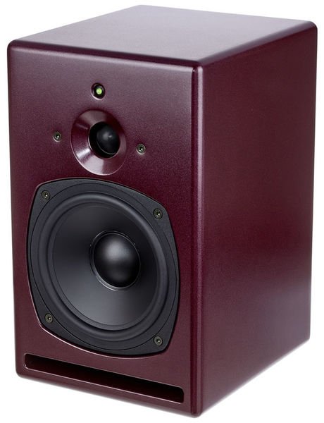 Red studio monitor speaker with black drivers and a small green light on the front panel.