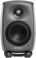 Front view of a gray studio monitor speaker with black speaker grilles and a green indicator light.