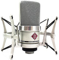Silver studio microphone with a mesh grille and attached shock mount stand shown frontally.