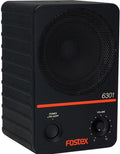 Black rectangular speaker with metal mesh grille, power button with indicator light, and volume knob.