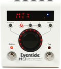 White Eventide H9 Harmonizer effects processor pedal with display, rotary knob, toggle switches, and footswitches.