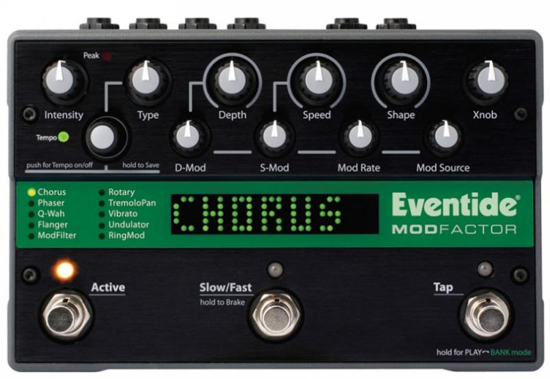 Black modulation pedal with multiple control knobs, footswitches, and digital display showing CHORUS effect.