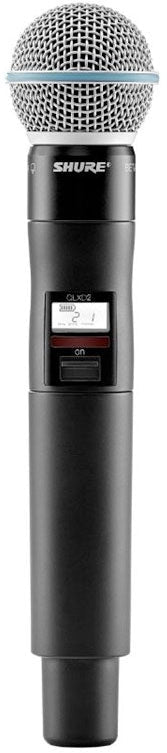 Black wireless handheld microphone with silver mesh grille and digital display showing channel information.