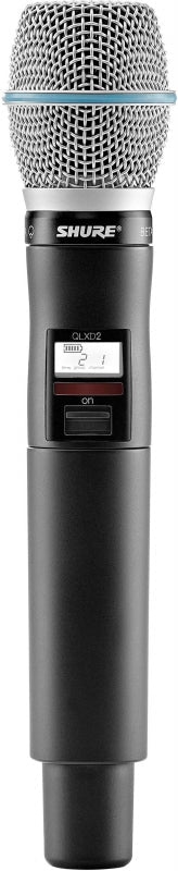 Black and silver wireless handheld microphone with a mesh grille and LCD screen displaying channel 21.
