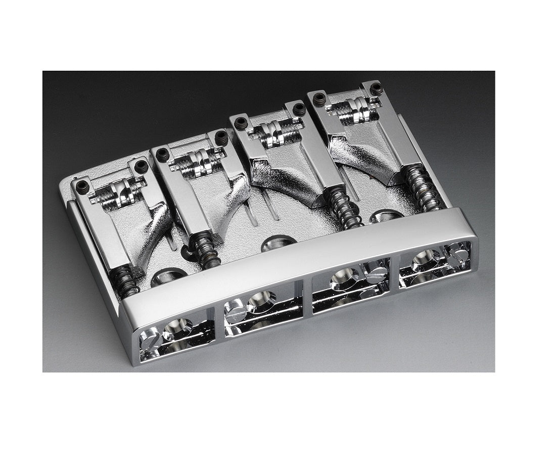 Chrome metal bridge with four adjustable saddles for string attachment on a musical instrument.