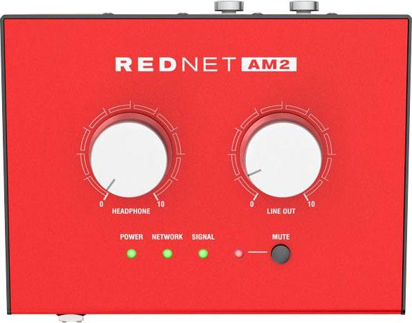 Red rectangular device with two large rotary knobs, status LEDs, and two round connectors on top.