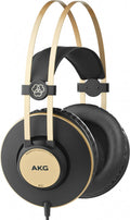 Black and gold over-ear wired headphones with padded earcups and dual metal headband supports.