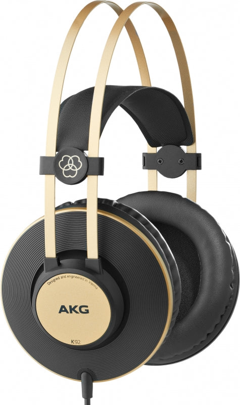 Black and gold over-ear wired headphones with padded earcups and dual metal headband supports.