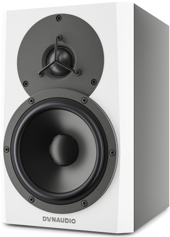 White studio monitor speaker with black circular drivers and DYNAUDIO branding on front.