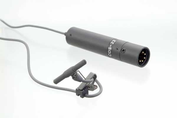 Black lavalier microphone with clip and attached cable shown against white background.