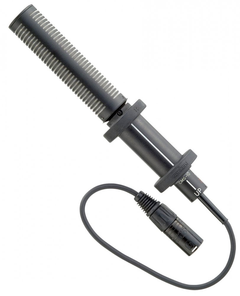 Black shotgun-style microphone with a metal grille and attached XLR cable connector.