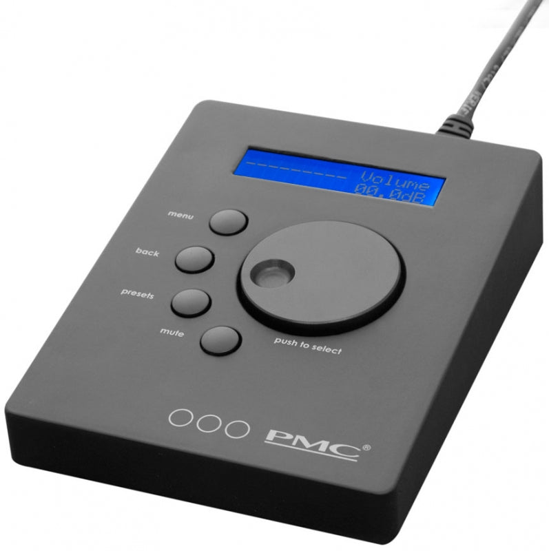 Black monitor controller with rotary knob, four push buttons, and a small blue display showing volume level.