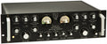 Black audio processor unit with multiple knobs, switches, and two analog meters on the front panel.