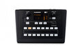 Black Allen & Heath ME-1 audio device with display, multiple buttons, knobs, and a 1/4 inch jack on top.