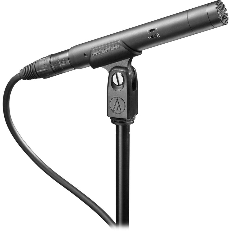 Black audio-technica microphone mounted on a stand with cable attached and a slide switch on its body.
