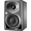 Black studio monitor speaker with a tweeter and larger woofer protected by metal mesh and front bass ports