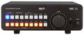Black SPL SMC 7.1 monitor controller with illuminated buttons, volume dial, and headphone jack on front panel.