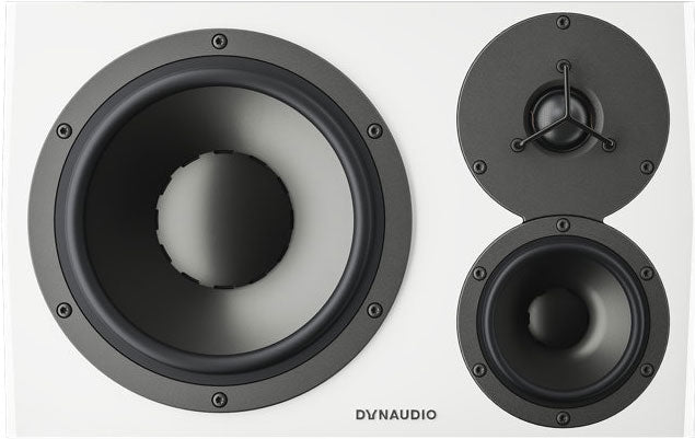 Front view of a white speaker with three drivers and DYNAUDIO brand text on the front.