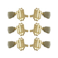 Set of six gold Grover Deluxe guitar tuning machines with cream tuning pegs arranged in two columns.