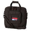 Black square carrying bag with handles, shoulder strap, front zippered pocket, and Gator Cases logo embroidered.