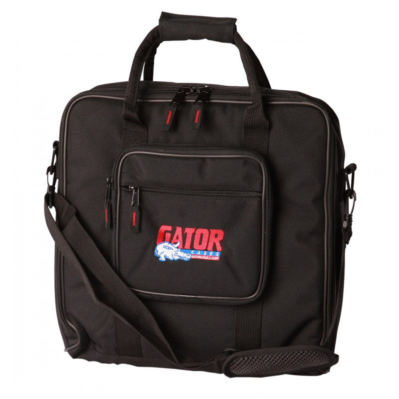 Black square carrying bag with handles, shoulder strap, front zippered pocket, and Gator Cases logo embroidered.