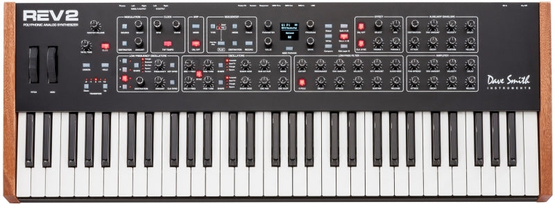 Black polyphonic analog synthesizer keyboard with wooden side panels and multiple control knobs and buttons.
