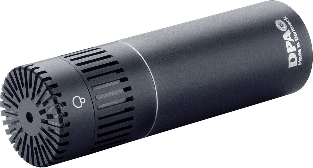 Black cylindrical microphone with vented grille and rotary switch on the body