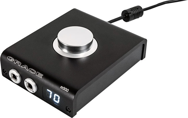 Black audio volume control device with rotary knob and two headphone jacks showing a digital display of 70.