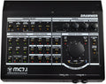 Black audio monitor controller with multiple buttons, knobs, speaker labels, headphone jacks, and talkback controls.