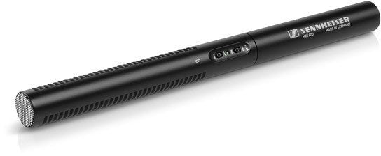 Black cylindrical shotgun microphone with metal grille on one end and three switches on its side.