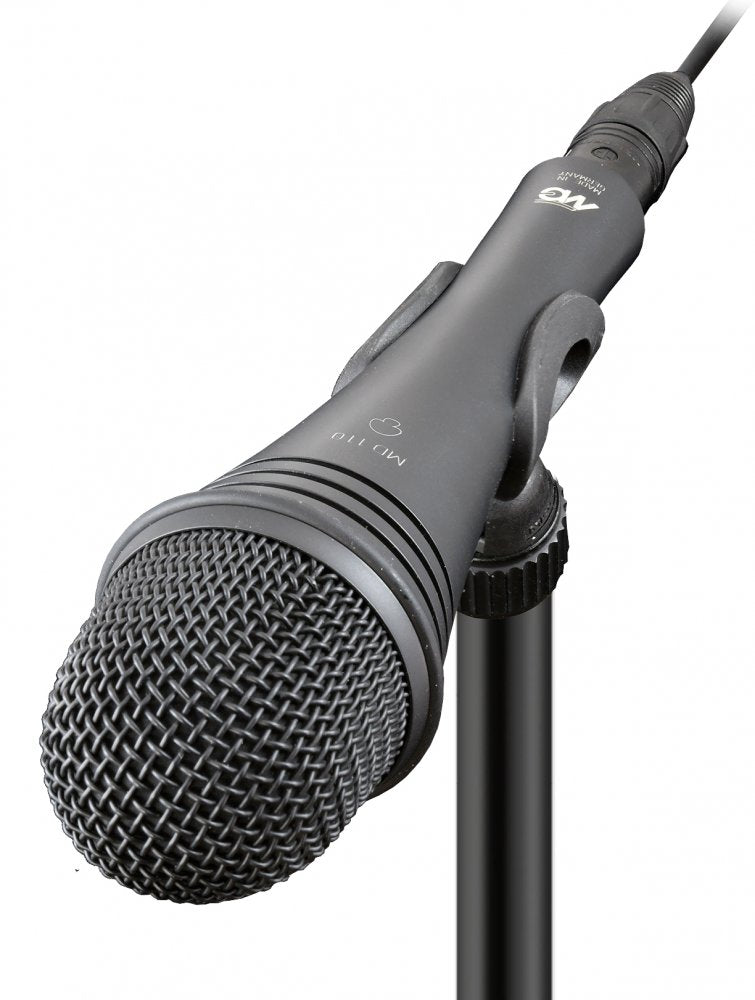 Black handheld microphone with visible metal grille, on/off switch, and attached audio cable on a stand.