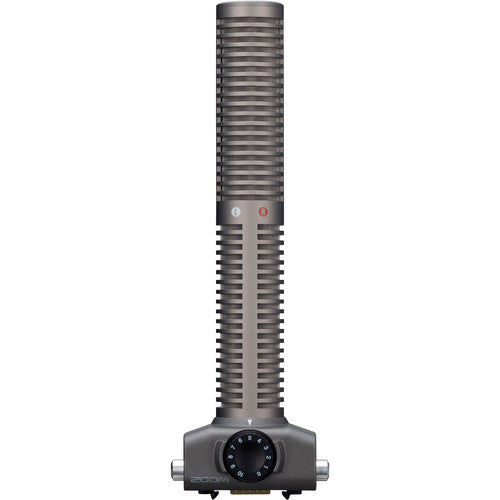 Gray shotgun microphone capsule with a rotary dial control and ZOOM brand text at the base.