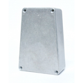 A trapezoid-shaped metal enclosure with four screw holes on the front face.