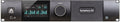 Front view of a black audio converter unit with display, control knob, headphone jack, and Symphony I/O branding.