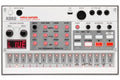 White KORG Volca Sample digital sample sequencer with knobs, buttons, LED display, and multiple ports on top panel.