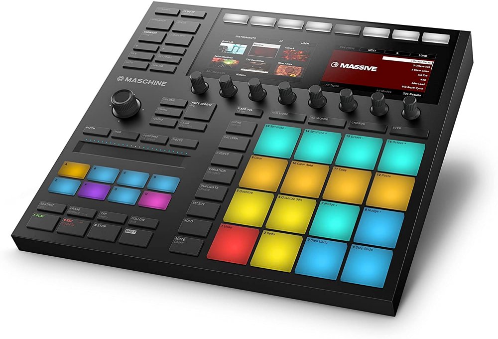 Black Native Instruments Maschine MK3 drum machine with colorful pads and dual display screens.