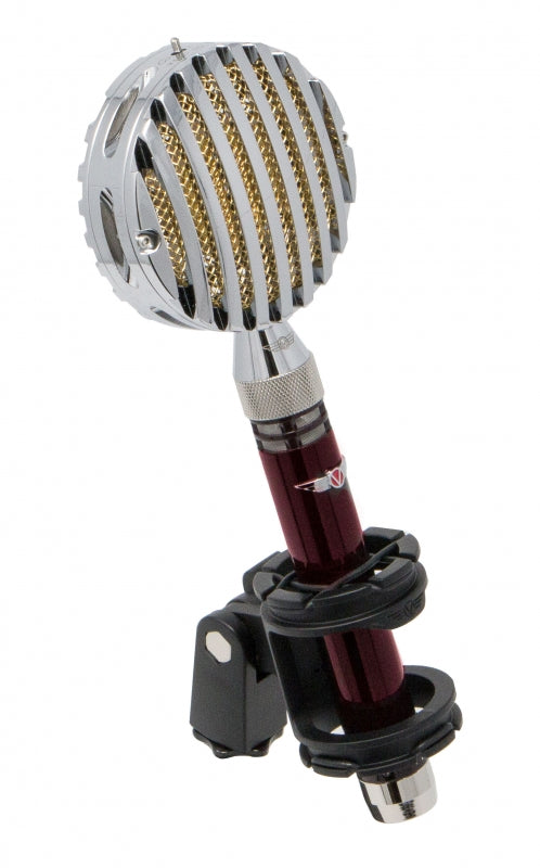 Retro-style microphone with silver grill, gold mesh, maroon body, and black shock mount.