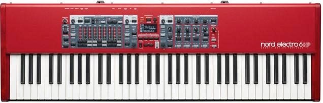 Red keyboard synthesizer with 73 keys and multiple control knobs, sliders, and buttons on the top panel.