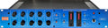 Front panel of a blue quad discrete VCA compressor with knobs, switches, LED meters, and a jack.