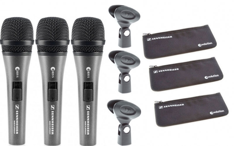 Three black Sennheiser handheld microphones, three microphone clips, and three black zippered pouches on white background.