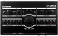 Top view of a Drawmer CMC3 monitor controller with knobs, switches, and buttons for talkback, source select, speaker select, and headphone control.