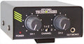Black audio device with two rotary knobs, a toggle switch, and a 1/4 inch output jack on front panel.