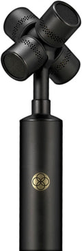 Black multi-capsule microphone with four cylindrical heads arranged around a central stem and a gold circular logo on the body.